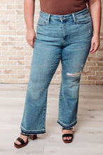 Load image into Gallery viewer, Judy Blue Isla Mid Rise Distressed Released Hem Bootcut Jeans
